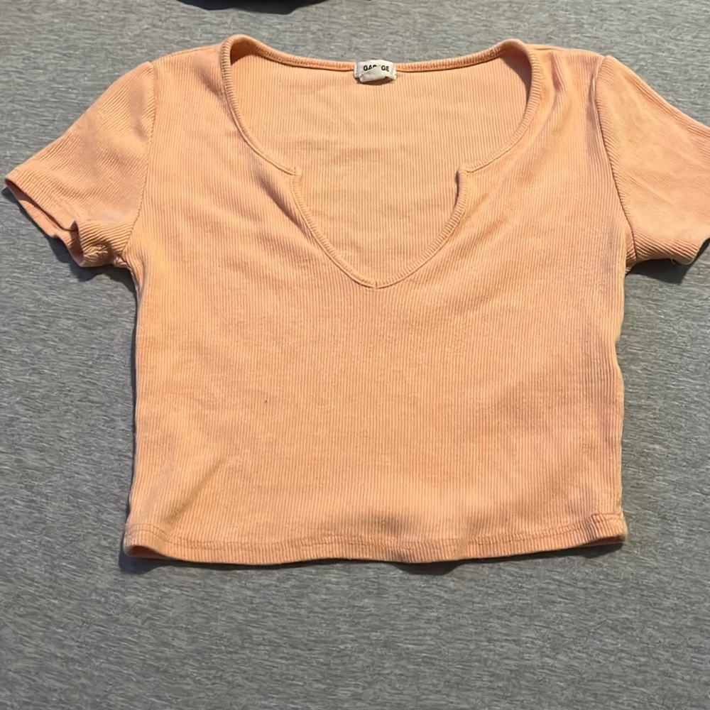Tight fired orange garage crop with v shape cut